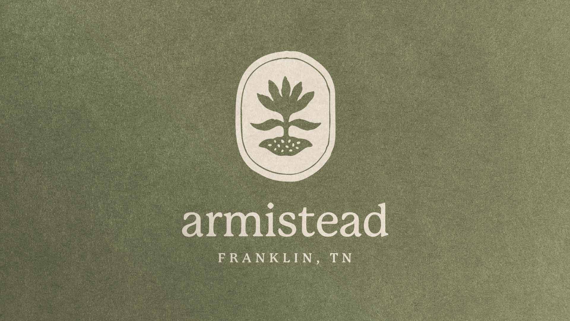 Armistead logo brand on top of a green paper background