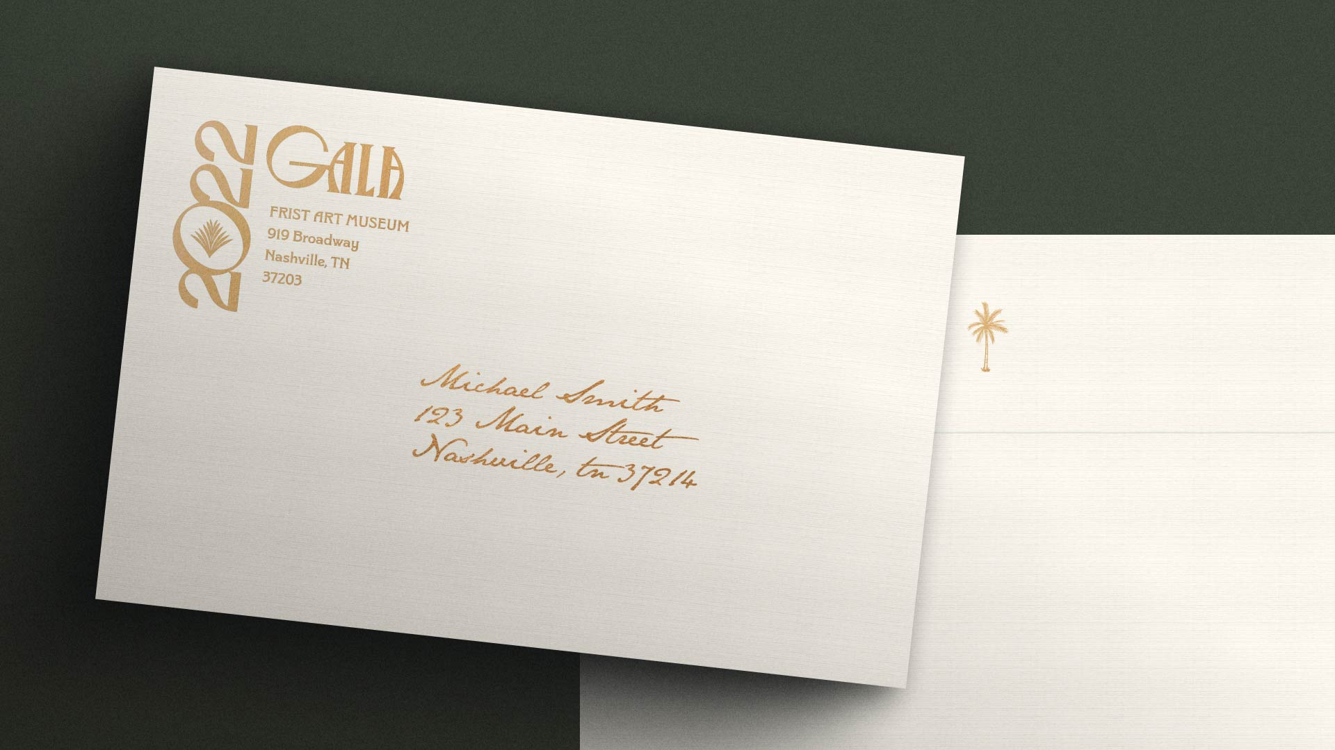Photo of the 2022 First Gala envelope on a dark green background
