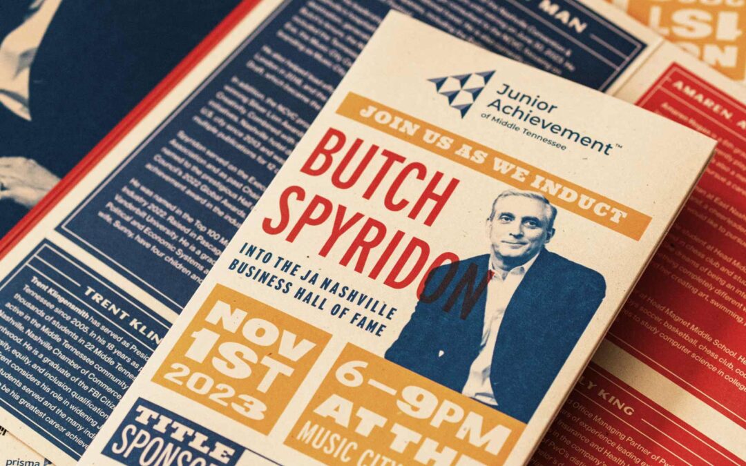 Zoom in of a folded brochure of the JA event honoring Butch Spyridon