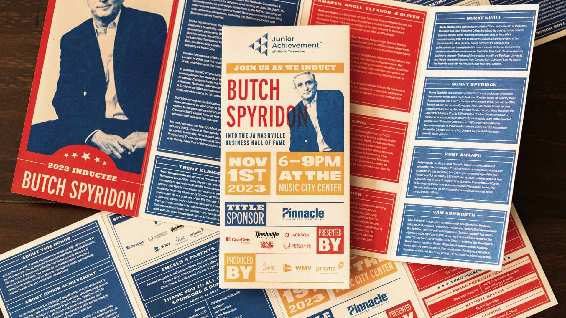 Folded brochure with Butch Spyridon's image on top of unfolded brochures