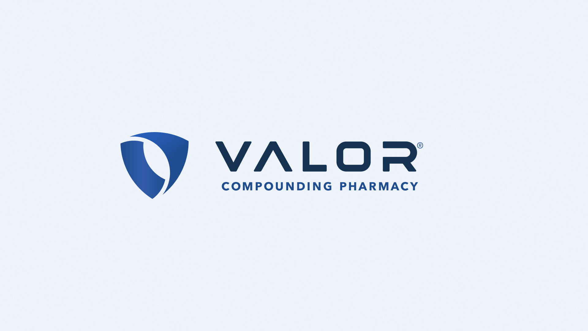 Valor Compounding Pharmacy logo on a light blue background.